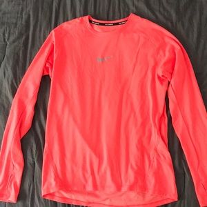 Large long sleeve neon nike athletic fit shirt.
